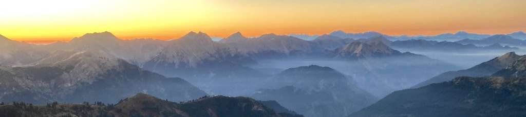 Sunrise across the mountain ridge